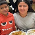 Catholic Charities Community Services Yonkers Lunch Mother and Son Eating