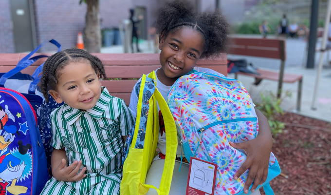 Children at a backpack giveaway event in the Bronx.