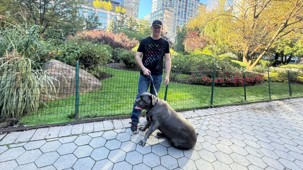 Borys with his dog, a Cane Corso, and guardian angel.
