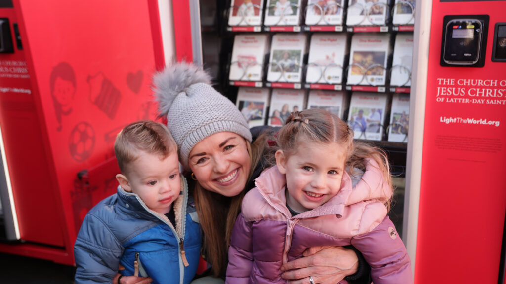 Giving Machine campaign launch in Times Square on December 1, 2025.
