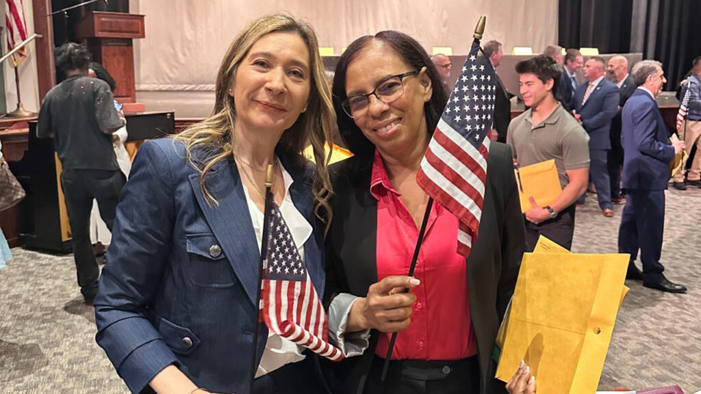 New United States citizens supported by Catholic Charities' International Center.