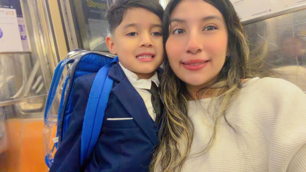 A mother and her son who are supported by the Cardinal Spellman Center.
